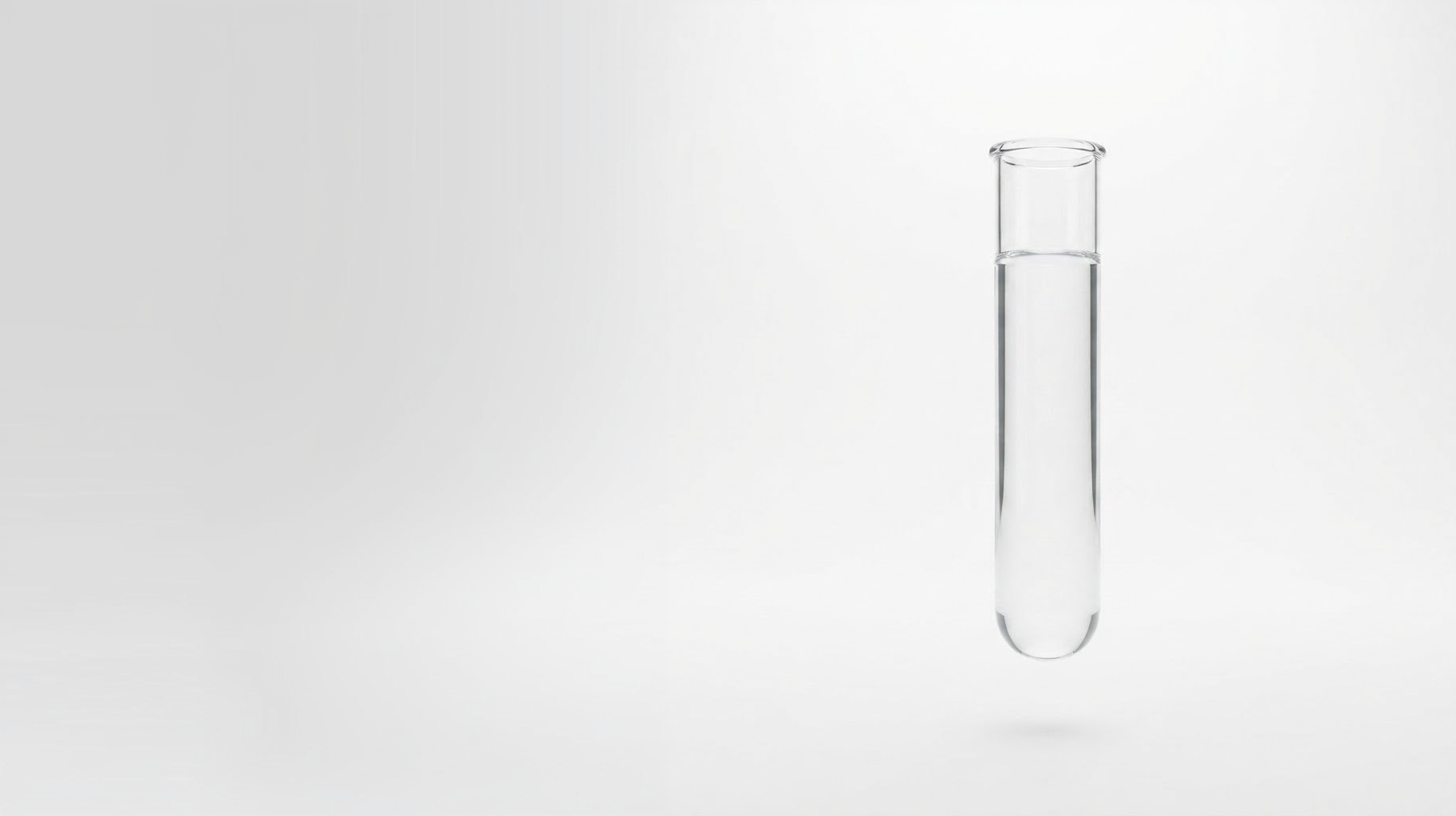 Glass test tube on a light background
